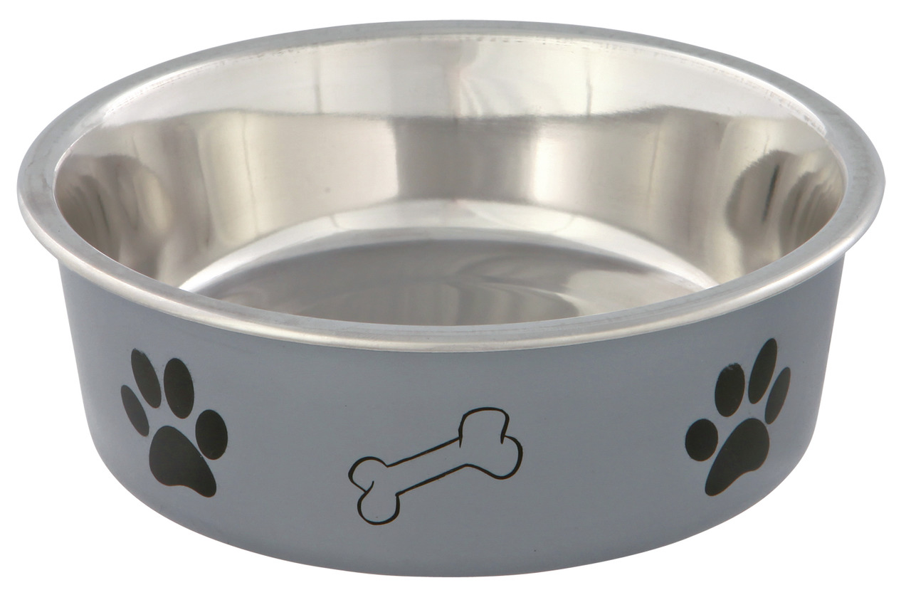 Edelstahl-Hundenapf von TRIXIE mit einem Fassungsvermögen von 0,45 Litern. Der Napf ist silberfarben, mit schwarzen Pfotenabdrücken und einem Knochenmotiv verziert. Geeignet für Hunde, ideal für Futter oder Wasser. Robustes Material, leicht zu reinigen un