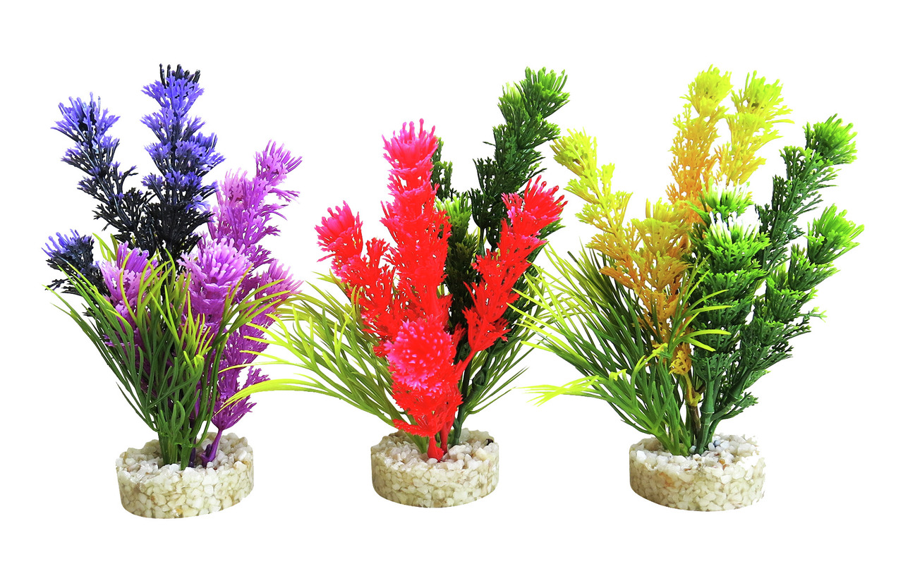 Künstliche Aquariumpflanzen von Sydeco, geeignet für Aquarienliebhaber. Das Bild zeigt drei bunte Pflanzen in Lila, Rot und Gelb-Grün, jeweils mit einem stabilen Kiesfuß. Ideal zur Dekoration und als Versteckmöglichkeit für Fische. Perfekt für Süß- und Sa