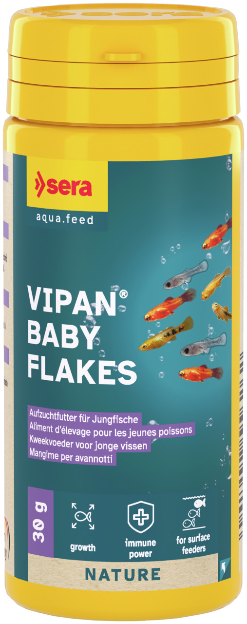 Das Bild zeigt eine gelbe Dose des Produkts "sera Vipan Baby Flakes" mit einem Fassungsvermögen von 30 g. Es handelt sich um ein Aufzuchtfutter für Jungfische, das speziell für Oberflächenfresser entwickelt wurde. Die Verpackung hebt Eigenschaften wie Wac