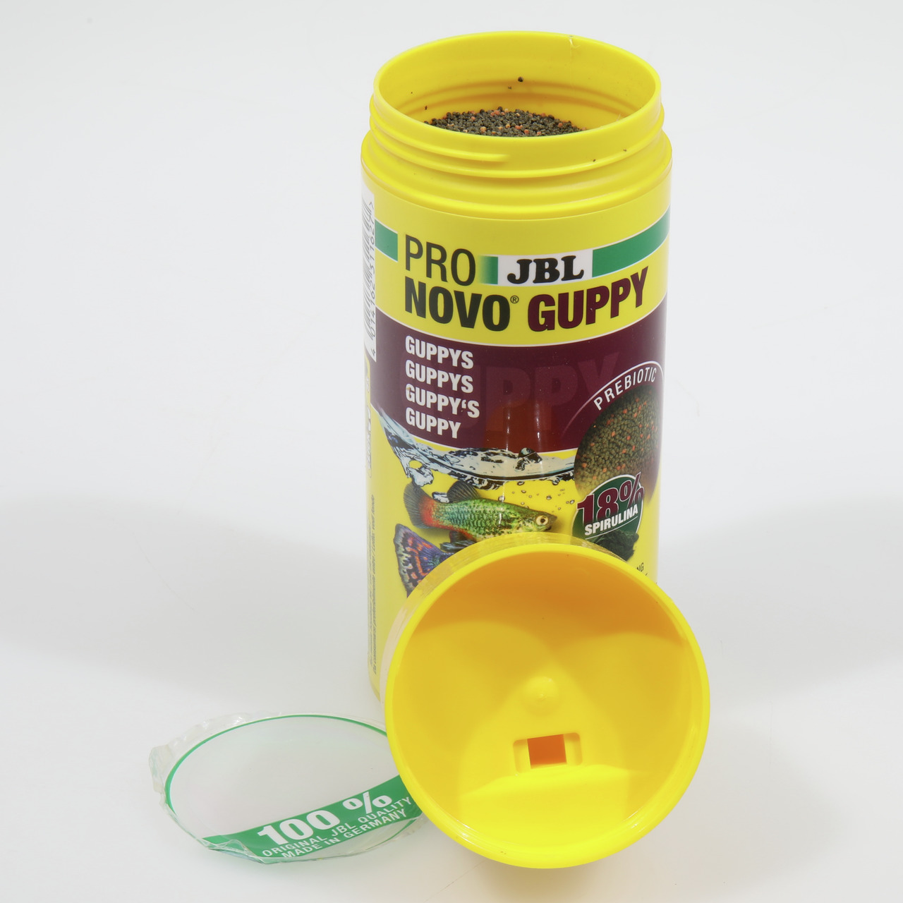 JBL Pro Novo Guppy, Fischfutter für Guppys, 18% Spirulina, Prebiotic, 100% Made in Germany, gelbe Dose, Inhalt sichtbar.