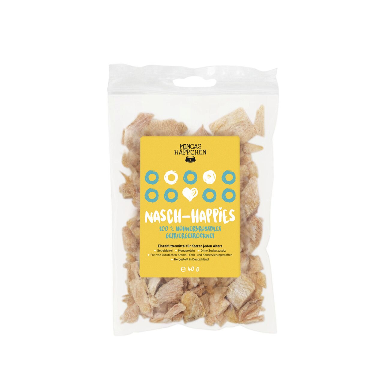 Das Bild zeigt eine transparente Verpackung mit gelbem Etikett der Marke "Mincas Häppchen". Das Produkt heißt "Nasch-Happies" und enthält 100 % getrocknetes Hühnerbrustfilet. Es ist ein Einzelfuttermittel für Katzen jeden Alters, frei von Zuckerzusätzen, 