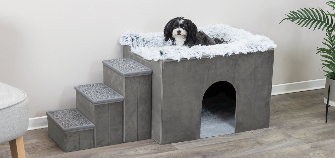 TRIXIE Hundebett m. Treppe, f. kl.-mittelgr. Hunde, grau-samtig, weiße Liegefl., Höhle u. Treppe, Komfort u. Sicherheit.