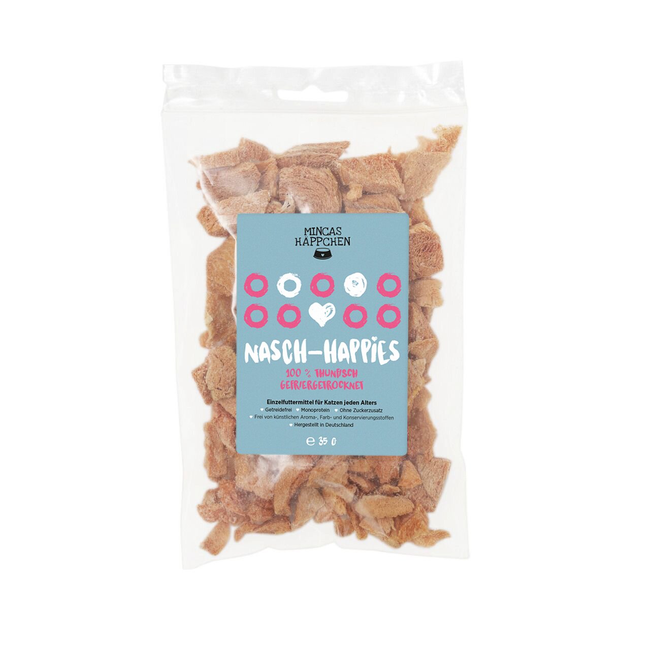 Das Bild zeigt eine transparente Verpackung mit der Aufschrift „MINCAS HÄPPCHEN Nasch-Happies“. Es handelt sich um ein Einzelfuttermittel für Katzen jeden Alters. Die Geschmacksrichtung ist 100 % Huhn, schonend gefriergetrocknet. Die Verpackung enthält 35