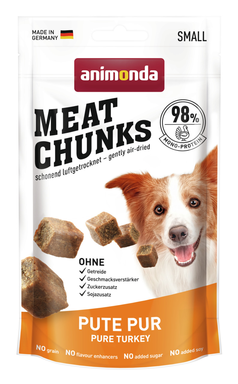 Das Bild zeigt eine Verpackung des Tierfutterprodukts „animonda Meat Chunks Pute Pur“ für Hunde. Die luftgetrockneten Snacks bestehen zu 98 % aus Monoprotein (Pute) und sind frei von Getreide, Geschmacksverstärkern, Zuckerzusatz und Sojazusatz. Die Verpac