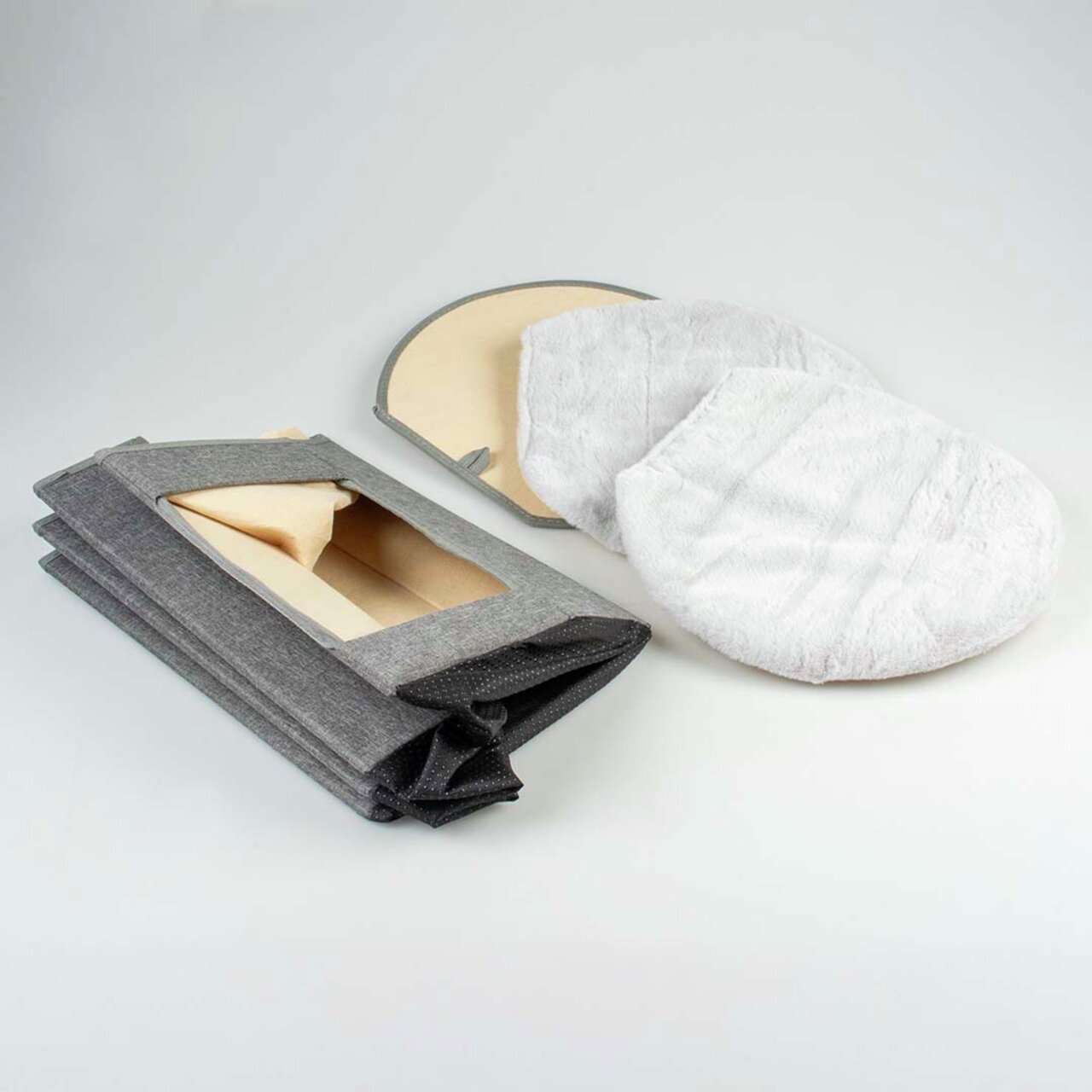 Zubehör von duvoplus für Haustiere: Faltbare graue Katzengrotte mit herausnehmbaren weißen Kuschelkissen, geeignet für Katzen.