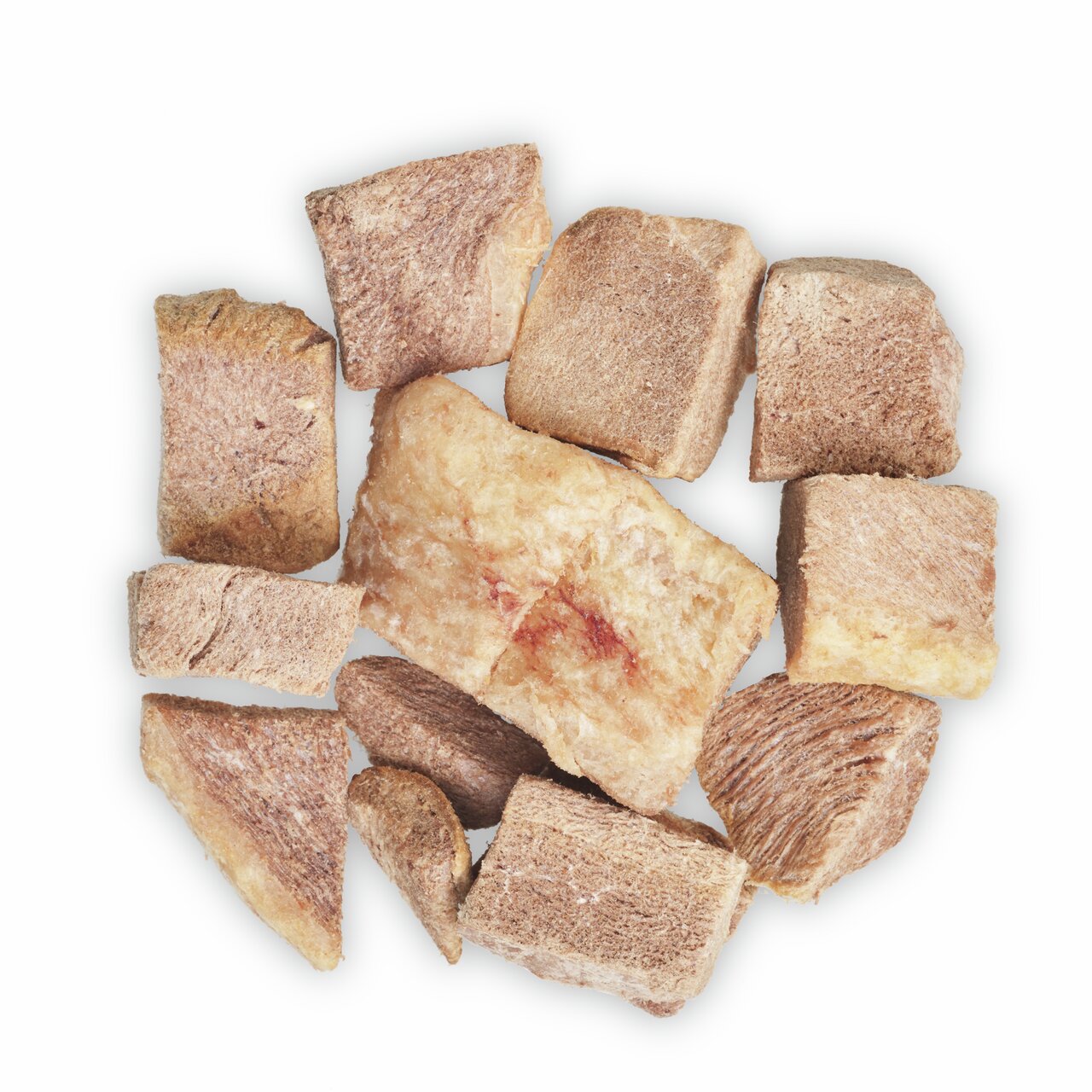 Das Bild zeigt gefriergetrocknete Fleischwürfel der Marke MINCAS HÄPPCHEN, geeignet als Snack für Hunde. Die Würfel bestehen aus reinem Rindfleisch, das schonend verarbeitet wurde, um Nährstoffe zu erhalten. Die Verpackungseinheit ist nicht sichtbar. Idea