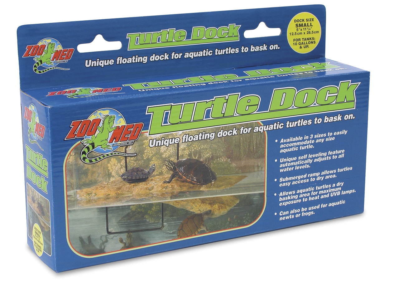 Das Bild zeigt die Verpackung der "Zoo Med Turtle Dock", einer schwimmenden Plattform für Wasserschildkröten. Die Zielgruppe sind Besitzer von Wasserschildkröten, Molchen oder Fröschen. Die Plattform bietet eine selbstnivellierende Funktion, eine unterget