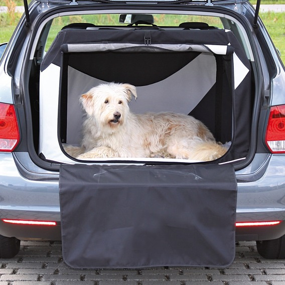 TRIXIE Transportbox für Hunde, schwarz-weiß, mit Schutzmatte, sicher & komfortabel, ideal für Reisen, im Auto-Kofferraum nutzbar.