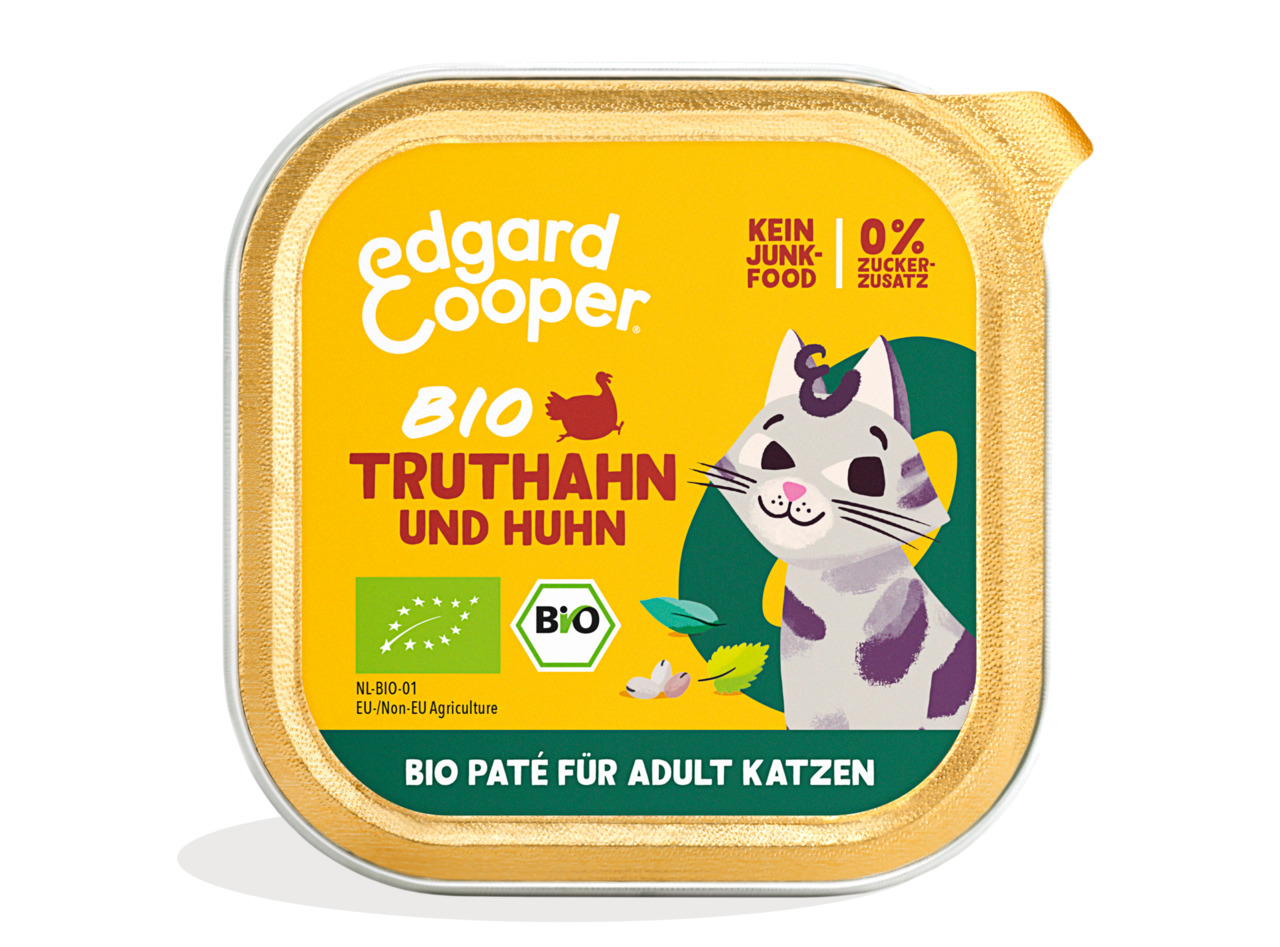Das Bild zeigt eine gelbe Verpackung des Katzenfutters „Edgard & Cooper Bio Truthahn und Huhn“. Es h