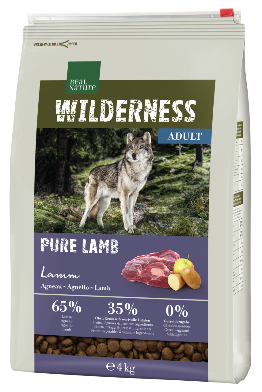 Das Bild zeigt eine Packung des Hundefutters „REAL NATURE WILDERNESS PURE LAMB“ für ausgewachsene Hunde. Die Geschmacksrichtung ist Lamm. Die Verpackung enthält 4 kg Futter mit 65 % Lamm, 35 % Obst, Gemüse und wertvollen Zutaten sowie 0 % Getreidezusatz. 