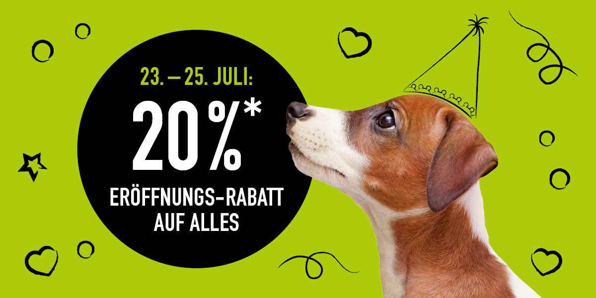 Grüner Hintergrund mit Hund der zur Aufschrift über die Neueröffnung in Gralla hochschaut.