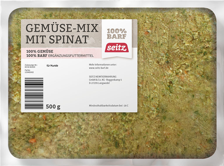 Das Bild zeigt eine Verpackung des Produkts „Gemüse-Mix mit Spinat“ der Marke Seitz. Es handelt sich um ein Ergänzungsfuttermittel für Hunde, bestehend aus 100 % Gemüse, geeignet für die BARF-Ernährung. Die Verpackung enthält 500 g. Das Produkt ist tiefge