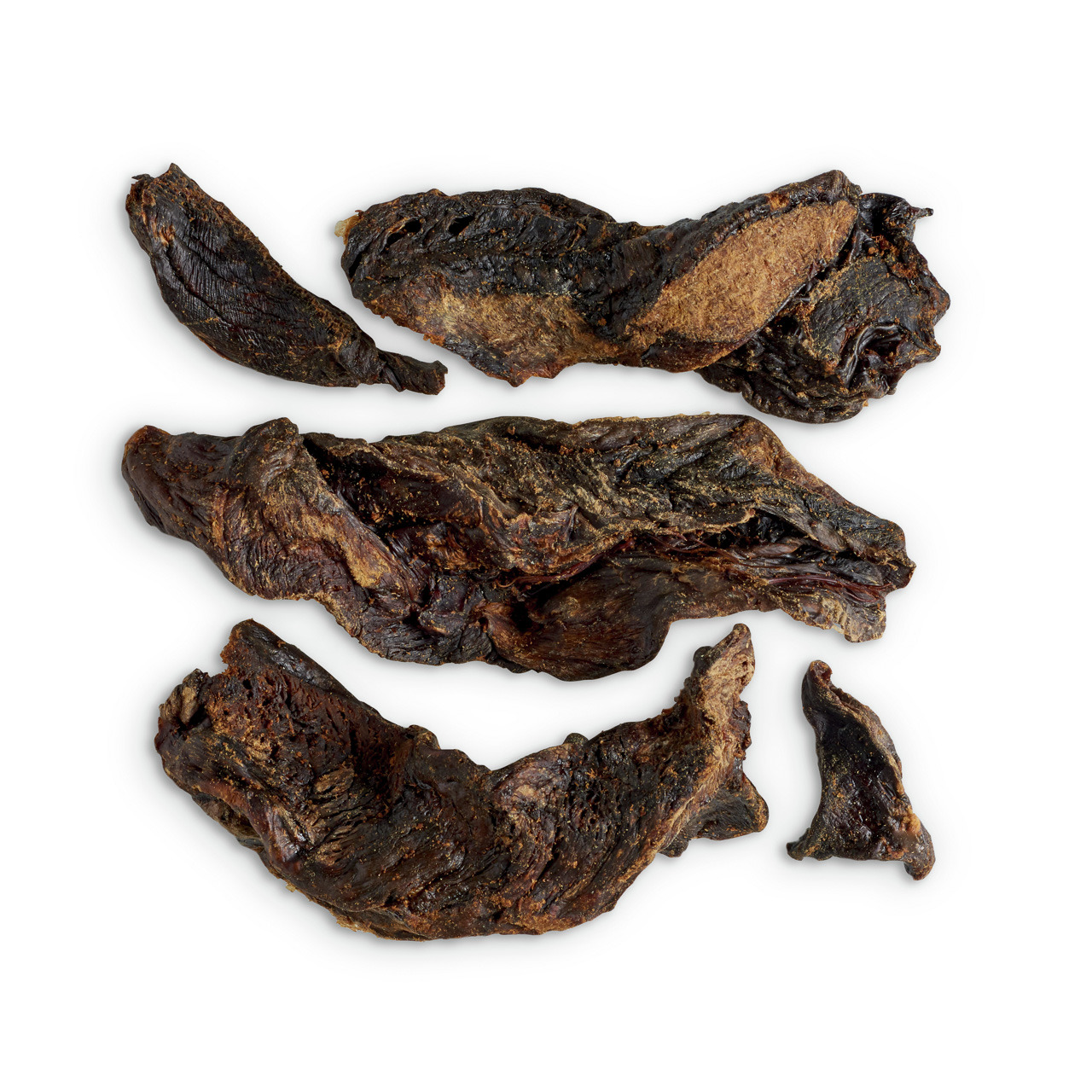 Das Bild zeigt getrocknete Rinderlunge von der Marke Lottis Häppchen, ein natürlicher Kausnack für Hunde. Die Zielgruppe sind Hunde aller Größen und Rassen. Der Snack ist fettarm, leicht verdaulich und reich an Proteinen, ideal zur Belohnung oder Beschäft