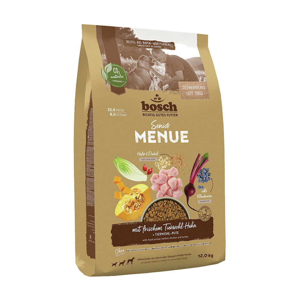 Das Bild zeigt einen 12-kg-Sack Bosch Senior Menü Hundefutter, speziell für ältere oder übergewichtige Hunde. Die Geschmacksrichtung ist Huhn und Pute aus Tierwohlhaltung, ergänzt mit Hafer, Dinkel und Blaubeeren. Die Verpackung betont CO2-Neutralität und