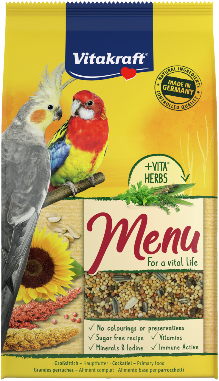 Das Bild zeigt eine Verpackung des Produkts „Vitakraft Menu“ für Großsittiche, insbesondere Nymphensittiche. Die gelbe Verpackung enthält Abbildungen eines Nymphensittichs und eines Rosellasittichs sowie eine Mischung aus Körnern und Saaten. Das Futter is