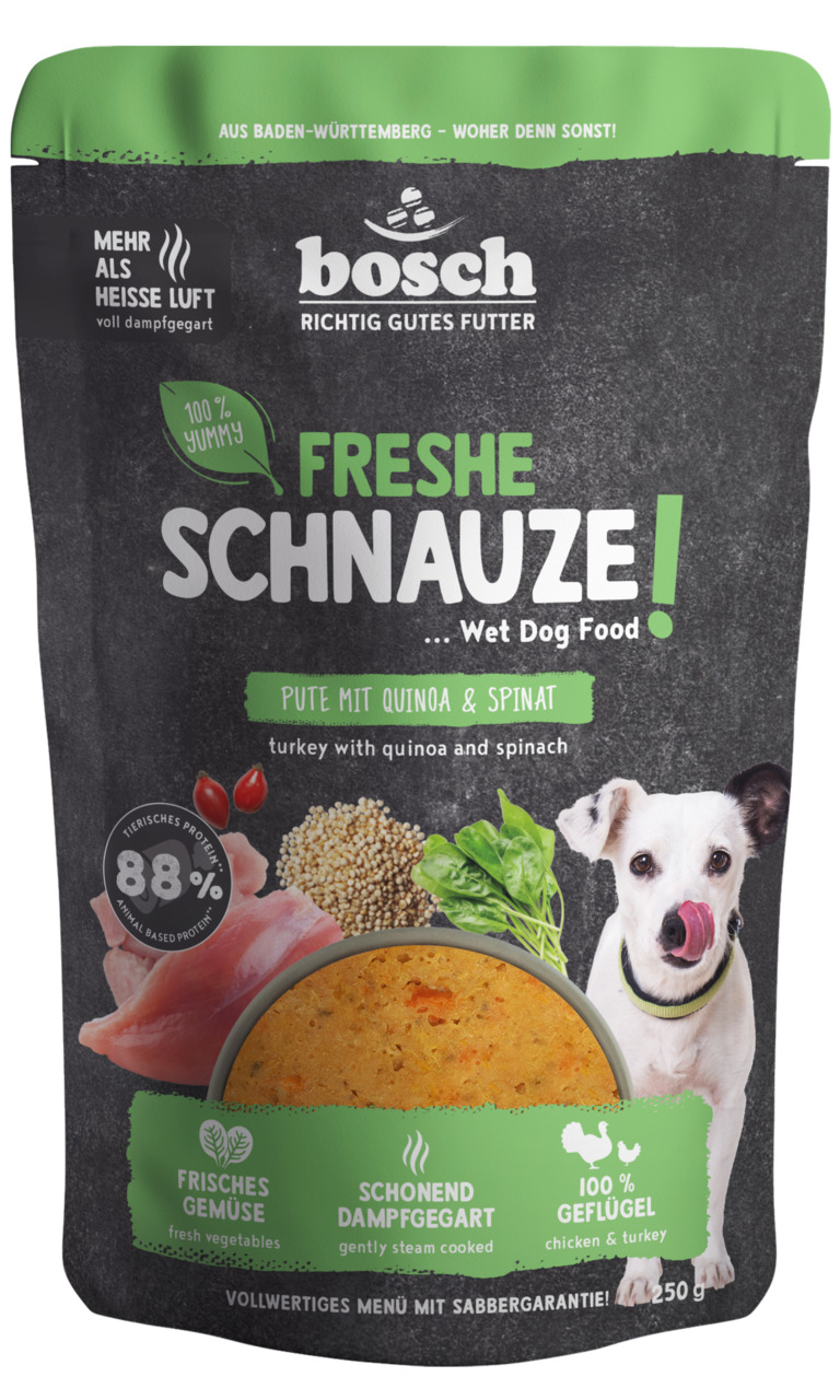 Das Bild zeigt eine Verpackung des Hundefutters „Freshe Schnauze!“ von Bosch Tiernahrung. Es handelt sich um ein Nassfutter für Hunde mit der Geschmacksrichtung Pute, Quinoa und Spinat. Die Verpackung enthält 250 g und wirbt mit 88 % tierischen Proteinen,