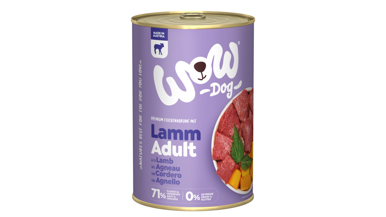 Das Bild zeigt eine violette Dose des Hundefutters „WOW DOG Lamm Adult“, hergestellt in Österreich. Es handelt sich um ein Premium-Feuchtfutter für ausgewachsene Hunde mit der Geschmacksrichtung Lamm. Die Dose enthält 71 % Fleisch und Innereien, ist getre