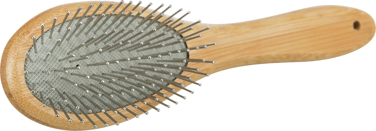 Hochwertige Hundebürste von TRIXIE mit ergonomischem Holzgriff und abgerundeten Metallborsten, ideal für die Fellpflege von Hunden. Geeignet für alle Felltypen, entfernt lose Haare und sorgt für glänzendes Fell. Nachhaltig aus Bambus gefertigt. Perfekt fü