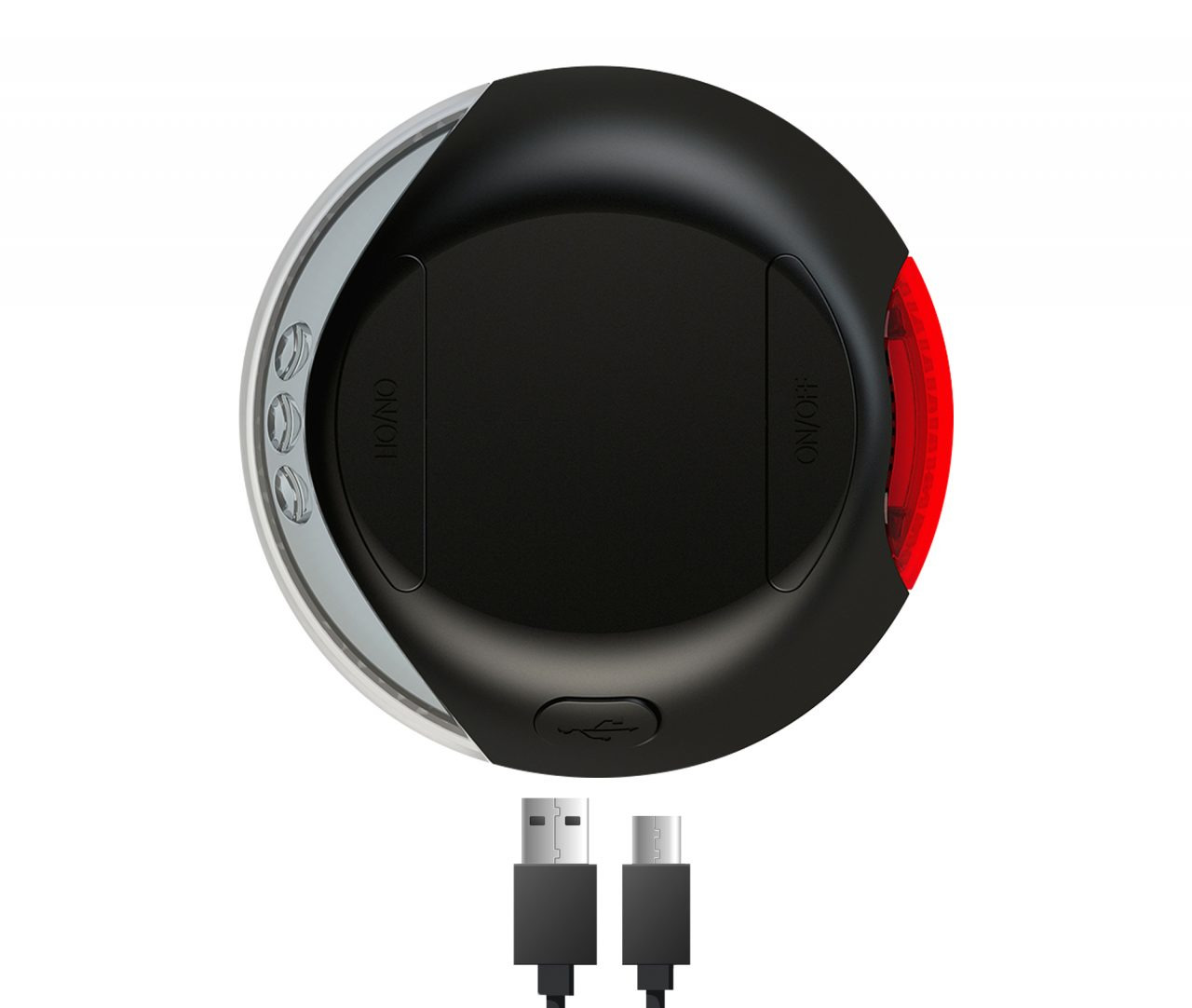 Das Bild zeigt das Flexi LED Lighting System, ein Zubehör für Flexi-Rollleinen. Es ist schwarz mit einem roten Rücklicht und wird mit einem USB-Ladekabel geliefert. Das Produkt ist für Hundebesitzer gedacht und dient der besseren Sichtbarkeit bei Spazierg