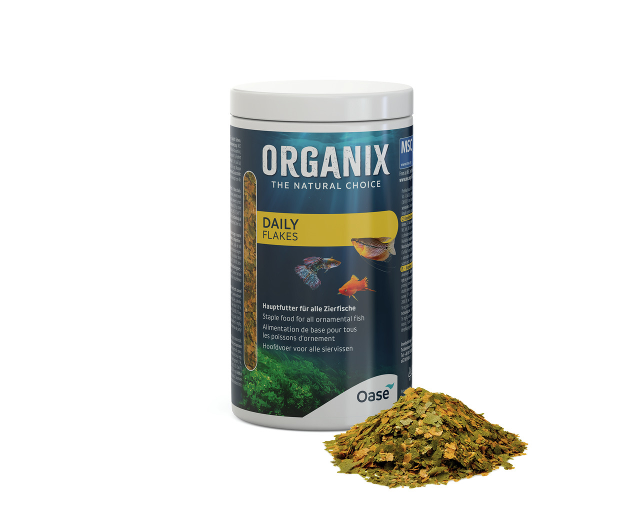 Das Bild zeigt eine Dose des Fischfutters „Organix Daily Flakes“ der Marke Oase. Es handelt sich um Hauptfutter für Zierfische, geeignet für alle Arten von Aquarienfischen. Die Verpackung ist dunkelblau mit gelbem Etikett und zeigt bunte Fische. Vor der D