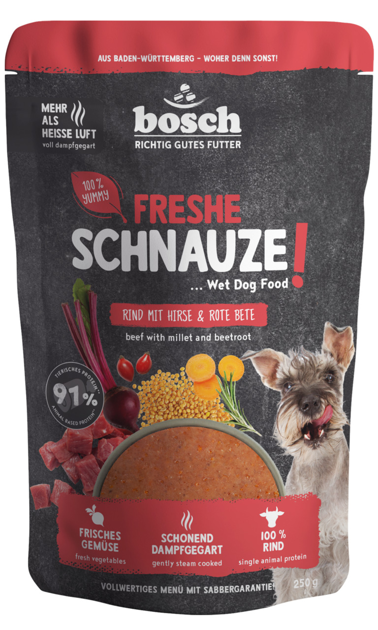 Das Bild zeigt eine Verpackung des Hundefutters „Freshe Schnauze!“ von Bosch Tiernahrung. Es handelt sich um ein Nassfutter für Hunde mit der Geschmacksrichtung Rind, Hirse und Rote Bete. Die Verpackung hebt hervor: 91 % tierisches Protein, frisches Gemüs