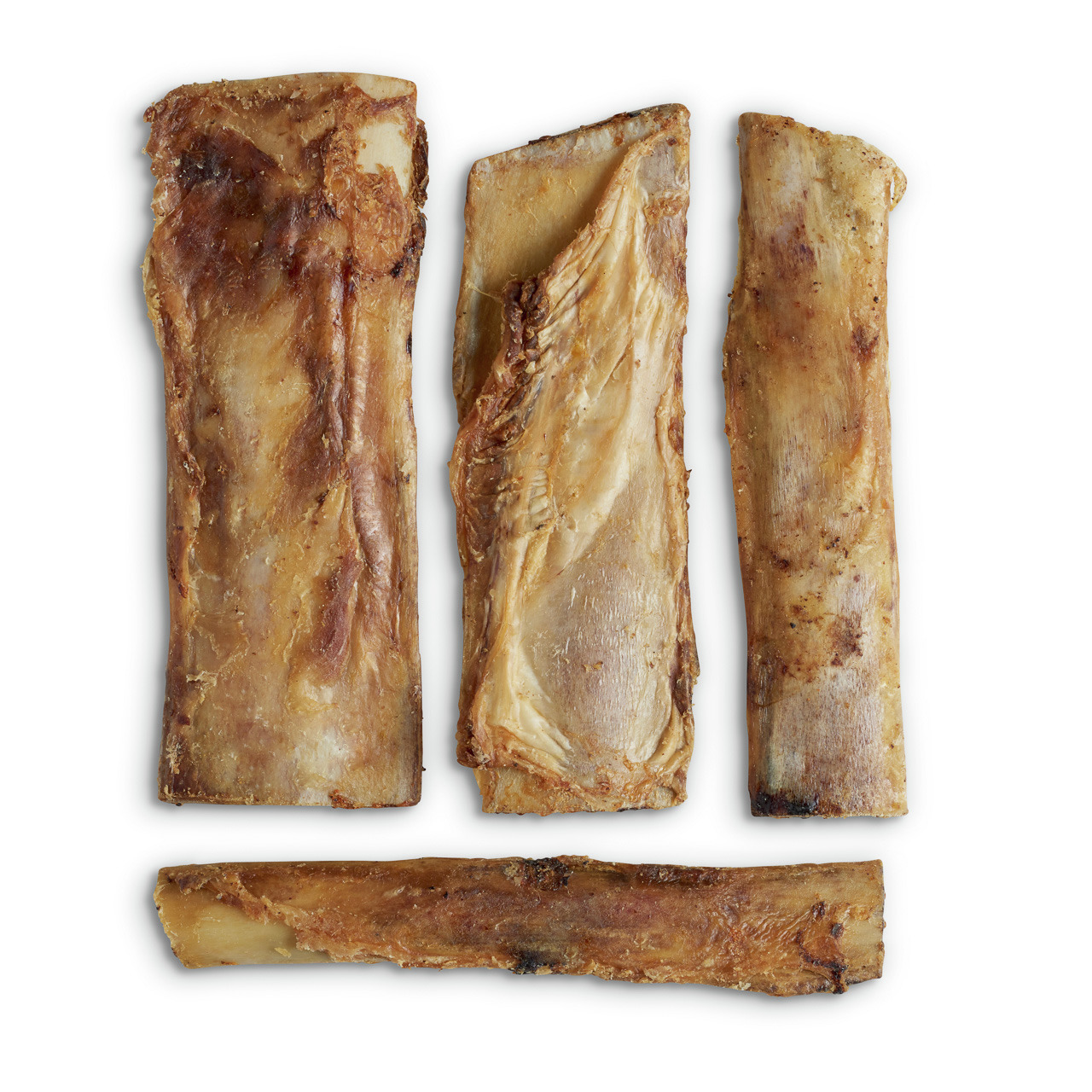 Das Bild zeigt vier natürliche Kauartikel der Marke Lottis Häppchen, speziell für Hunde. Es handelt sich um getrocknete Rinderknochen, die als gesunder Snack dienen. Die Kauartikel fördern die Zahnpflege und bieten langanhaltenden Kauspaß. Geeignet für Hu