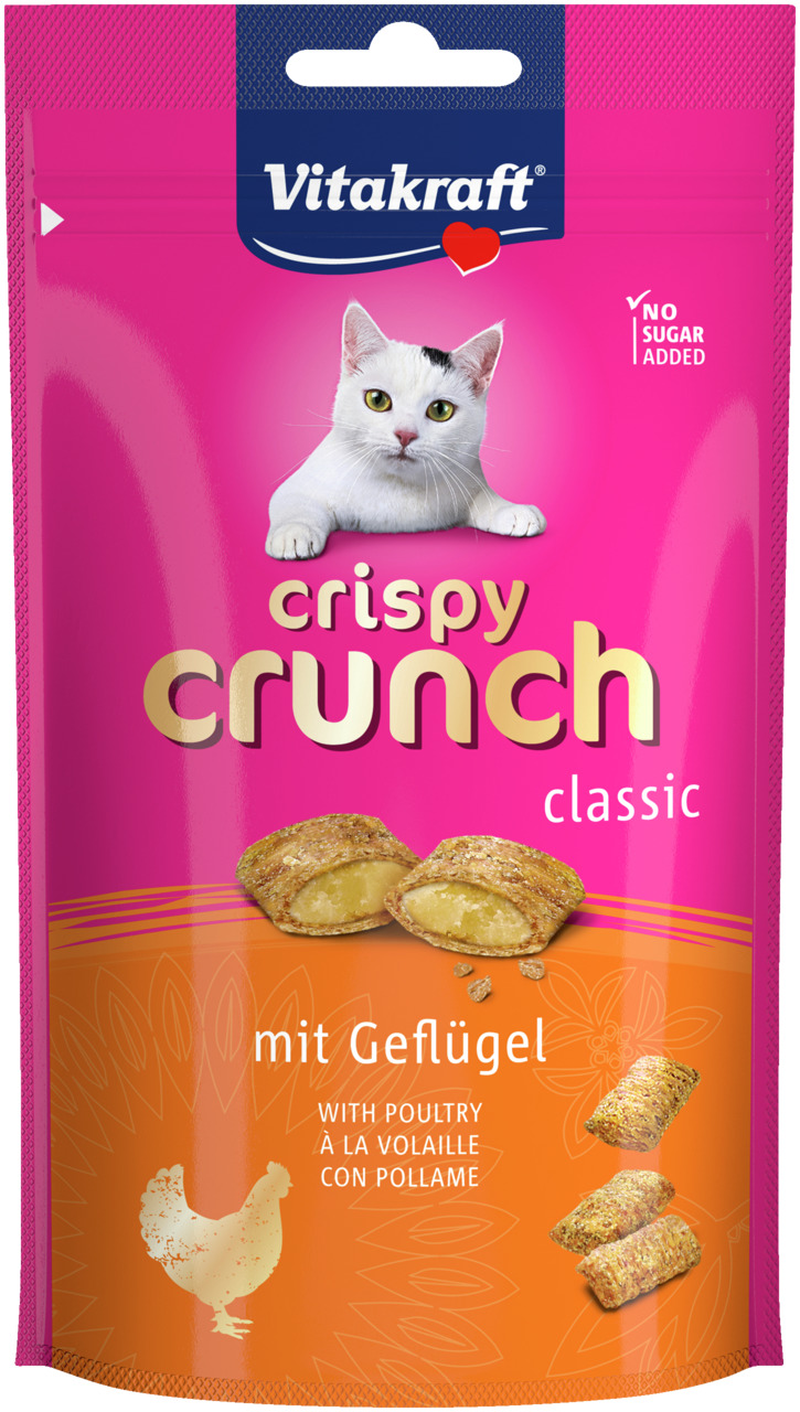 Das Bild zeigt eine pink-orangefarbene Verpackung des Katzenfutters „Vitakraft Crispy Crunch Classic“ mit Geflügelgeschmack. Die Zielgruppe sind Katzen. Auf der Verpackung ist ein weißes Kätzchen abgebildet, daneben der Hinweis „No Sugar Added“. Die Packu