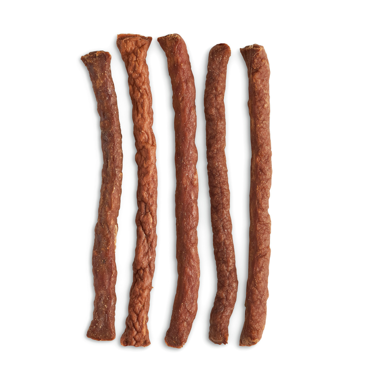 Das Bild zeigt fünf längliche, braune Kaustangen der Marke Lottis Häppchen, die als Hundesnack dienen. Die Stangen sind gleichmäßig geformt und haben eine leicht raue Oberfläche. Sie sind für Hunde geeignet und bieten eine schmackhafte Belohnung. Geschmac