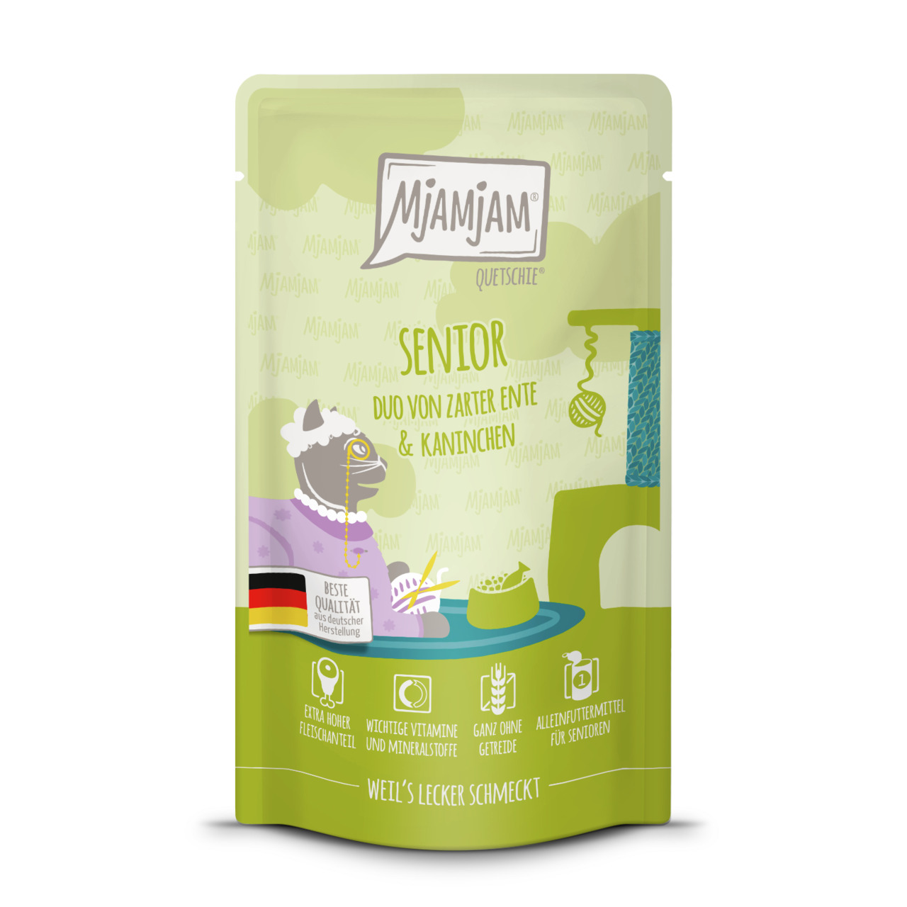 Das Bild zeigt eine grüne Verpackung des Katzenfutters „MJAMJAM Quetschie Senior Duo von zarter Ente & Kaninchen“. Es ist ein Alleinfuttermittel für ältere Katzen. Die Geschmacksrichtung ist Ente und Kaninchen. Die Verpackung betont „extra hoher Fleischan