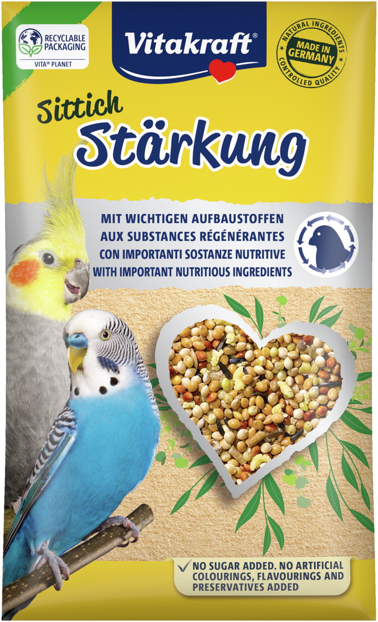Das Bild zeigt das Produkt „Vitakraft Sittich Stärkung“, ein Ergänzungsfuttermittel für Wellensittiche. Die Verpackung enthält 400 g und ist mit einem Herz aus Saaten illustriert. Es wird mit natürlichen Zutaten in Deutschland hergestellt und enthält kein