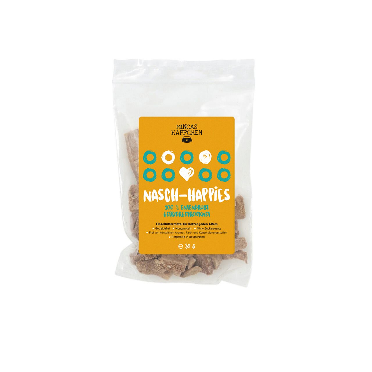 Das Bild zeigt eine transparente Verpackung mit der Aufschrift „MINCAS HÄPPCHEN Nasch-Happies“. Es handelt sich um ein Einzelfuttermittel für Katzen jeden Alters. Die Geschmacksrichtung ist 100 % Entenbrust, gefriergetrocknet. Die Verpackung enthält 35 g.