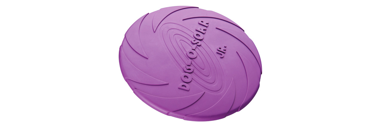 Lila Frisbee-Scheibe für Hunde der Marke TRIXIE, Modell "Dog-O-Soar Jr.", geeignet für kleine bis mittelgroße Hunde. Hergestellt aus robustem, bissfestem Material, ideal für Apportierspiele. Die Scheibe ist leicht und ergonomisch gestaltet, um das Werfen 