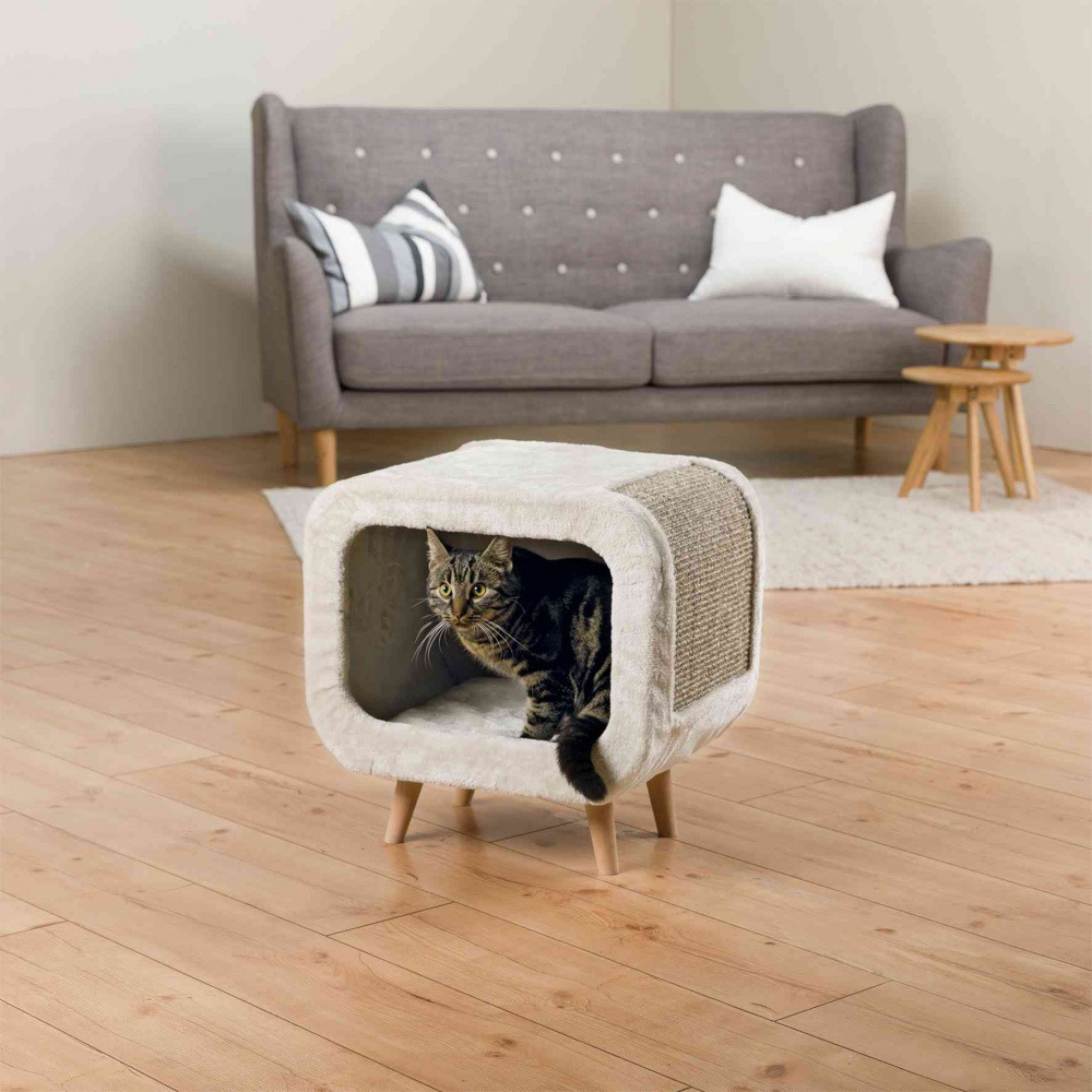Das Bild zeigt das TRIXIE Katzenhaus „Livia“, ein modernes Möbelstück für Katzen. Es ist für Katzen aller Größen geeignet und bietet eine gemütliche Höhle mit weichem Plüschbezug. Die Seiten sind mit Sisalflächen zum Kratzen ausgestattet. Das Katzenhaus s