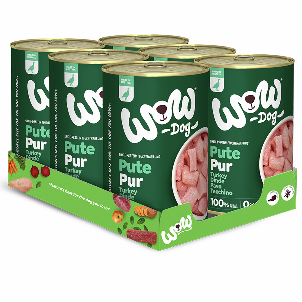 Sechs Dosen Hundefutter der Marke WOW DOG in der Sorte „Pute Pur“ für Hunde. Das Produkt ist eine Single-Protein-Nassfuttermischung mit 100 % Putenfleisch, ohne Zusatzstoffe. Verpackt in einer grünen Kartonhalterung mit Bildern von Zutaten. Gesamtmenge: 6