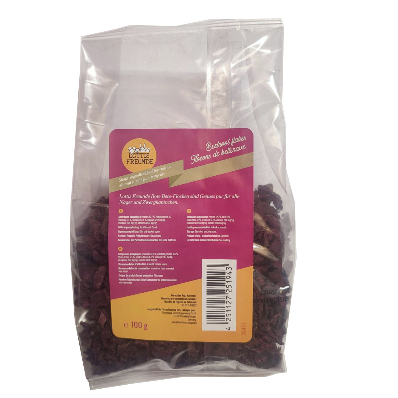 Das Bild zeigt eine transparente Verpackung mit einem pinkfarbenen Etikett der Marke "Lottis Freunde". Enthalten sind 100 g Rote-Bete-Flocken, ein Einzelfuttermittel für Nager und Zwergkaninchen. Die Verpackung hebt die natürliche Zusammensetzung hervor u