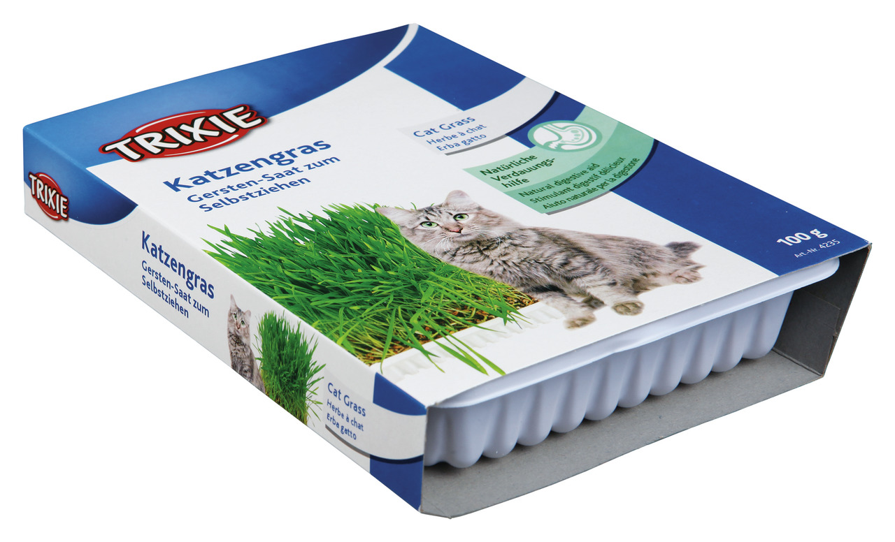 Das Bild zeigt das Produkt "TRIXIE Katzengras", eine Packung mit Gersten-Saat zum Selbstziehen, speziell für Katzen. Die Verpackung ist blau-weiß gestaltet und zeigt eine Katze neben frischem Katzengras. Es wird als natürliche Verdauungshilfe beworben. Di